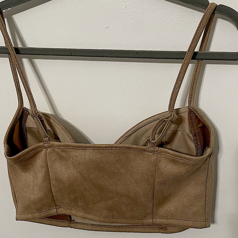 A Blāshe tan medium crop top that will go with any outfit.